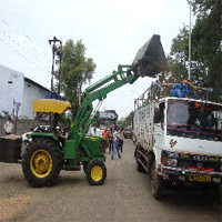 tractor mounted biomass briquette loaders